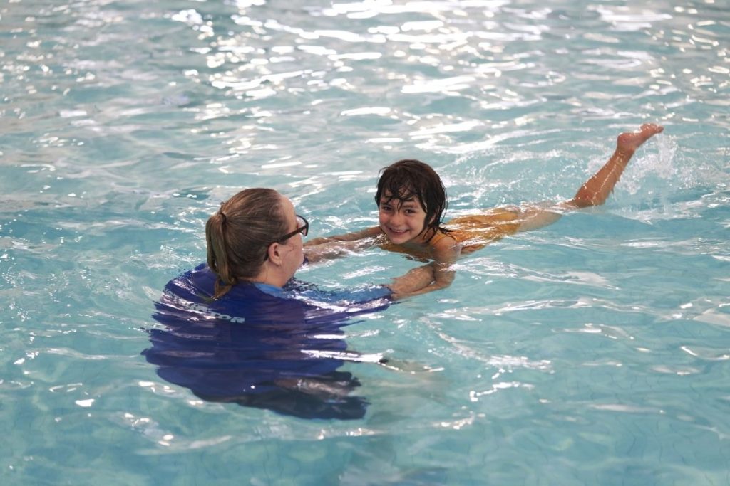 child practice swimming regularly