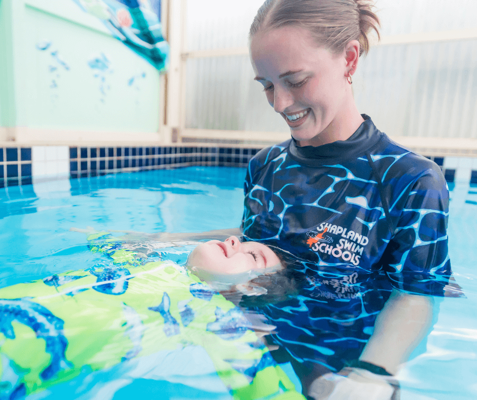 Child’s first swimming lesson